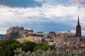 View of the skyline of the city of Edinburgh with the Edinburgh Castle on the background in Scotland